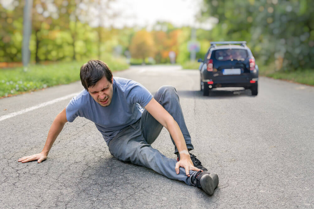 Pedestrian got hit and run suffering leg injuries.