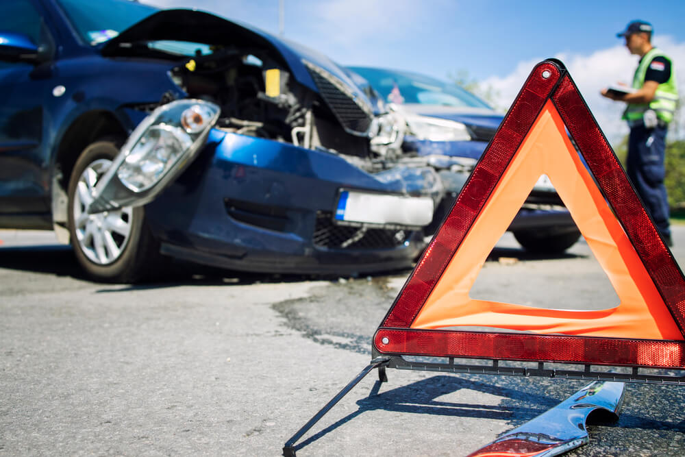 Caution warning sign for the car accident