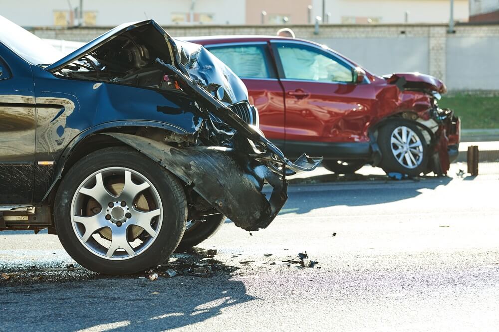 Car accidents happening along the highway.