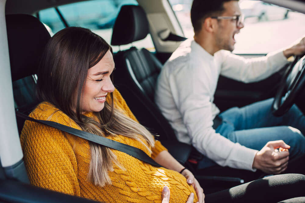 Pregnant passenger feeling pain going for labor.