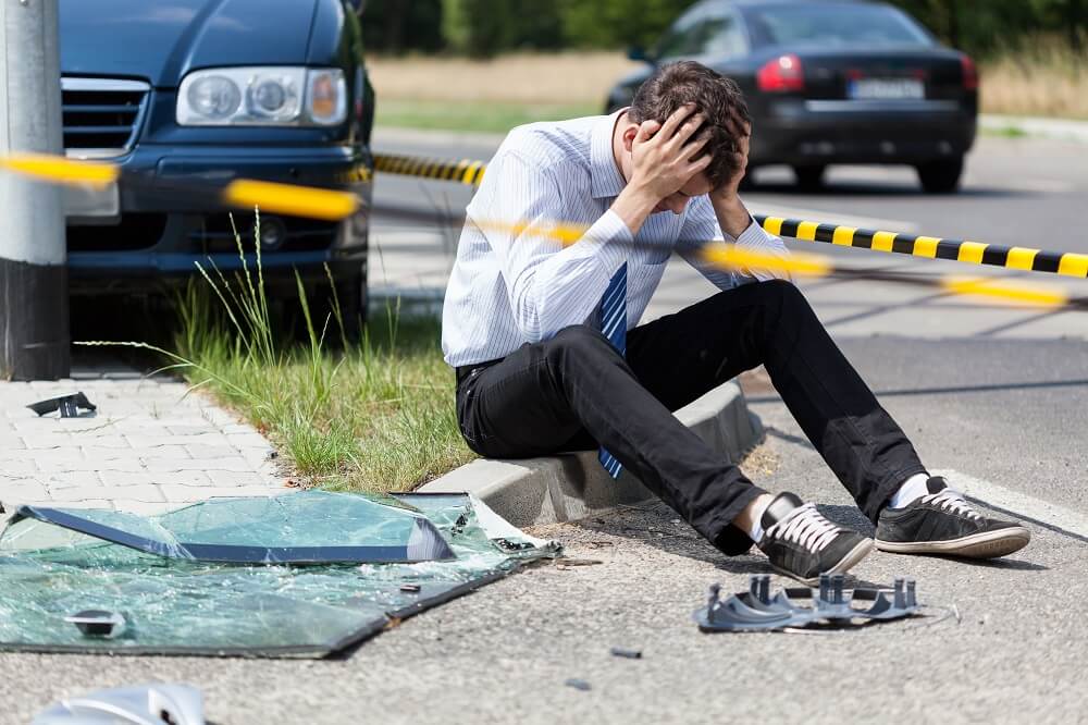 Problematic driver from the accident suffering headache.