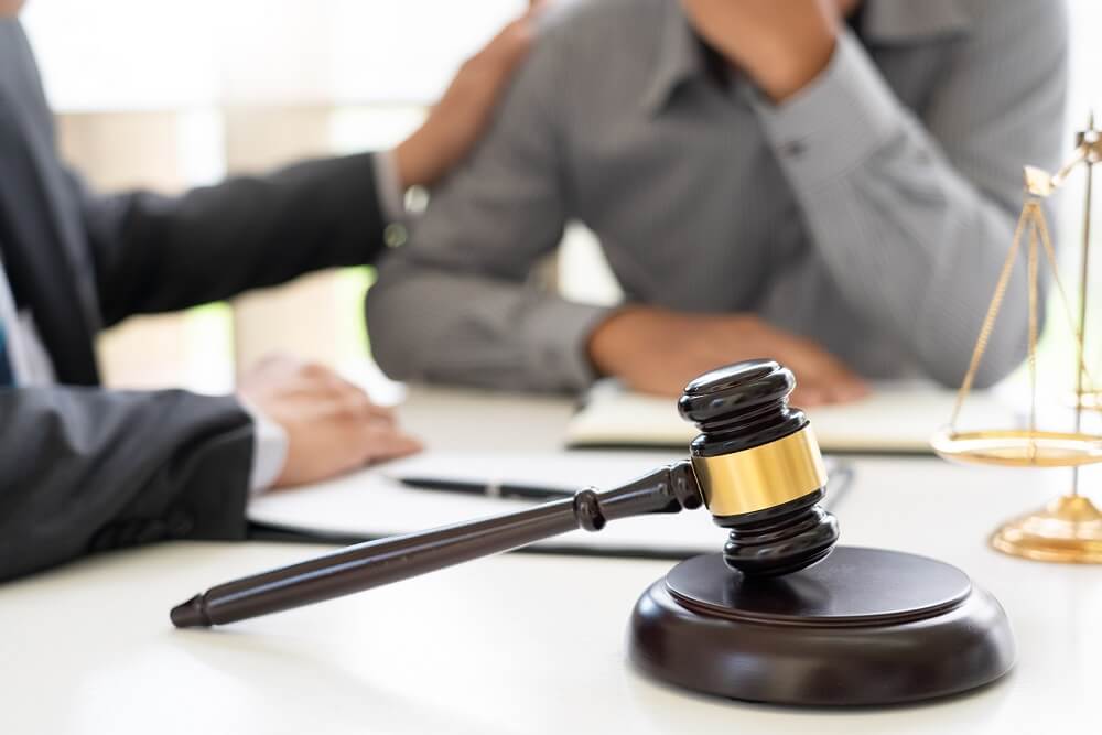 Problematic client consulting personal injury lawyer to file for lawsuit.
